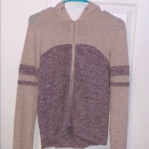 tan and purple zip up